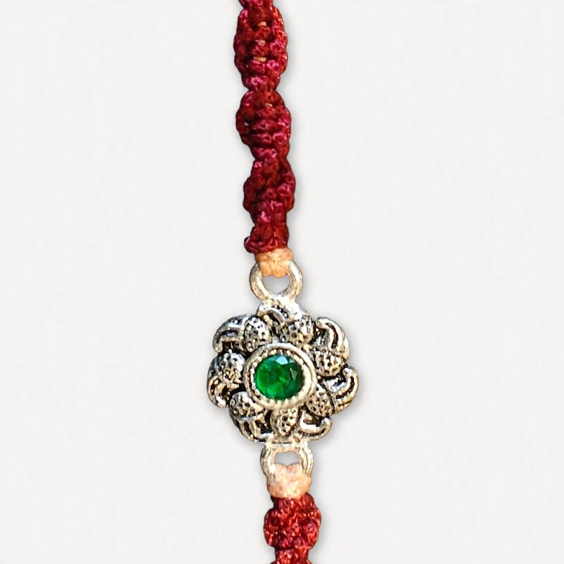 Oxidised Silver Floral Rakhi with Green Stone